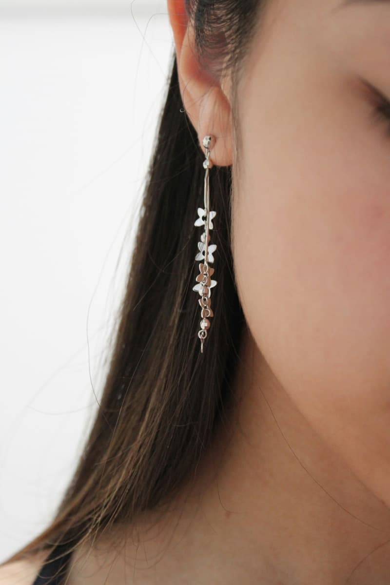 Creator's close-up of a floral earring